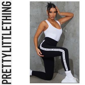 Black Side Tape Leggings Prettylittlething